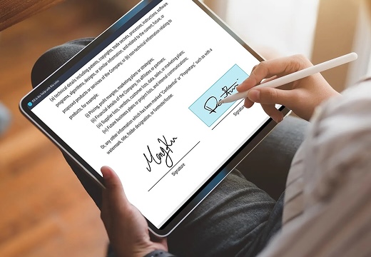 Customer signing digital waiver on iPad